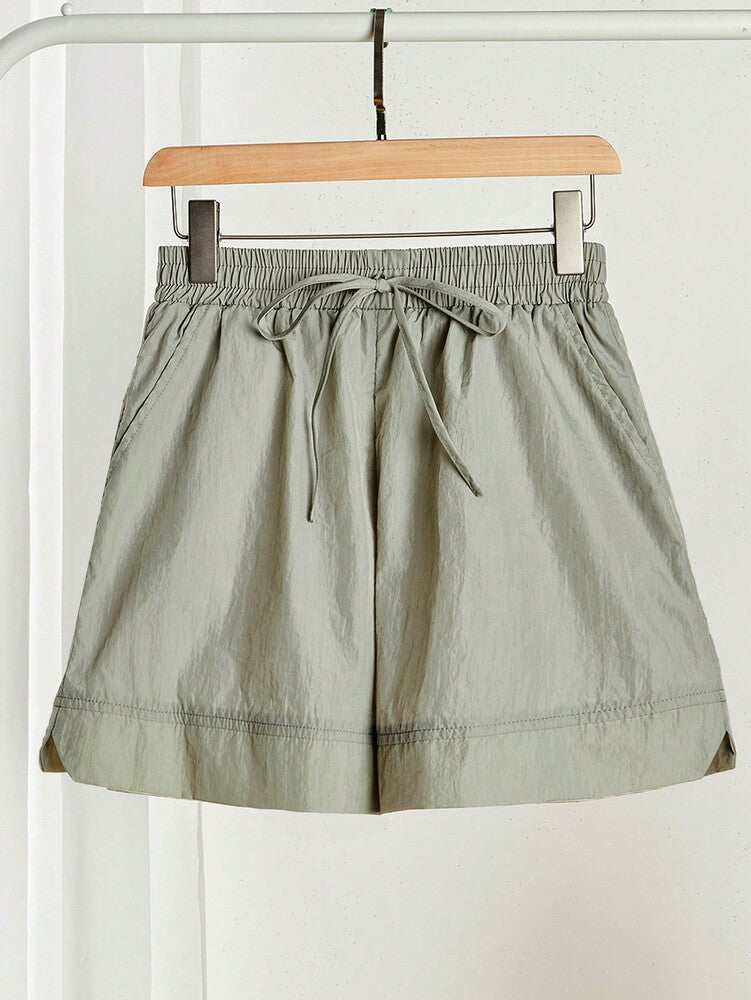 SHEIN EZwear Women's Solid Color Front Tie Pocket Casual Shorts
