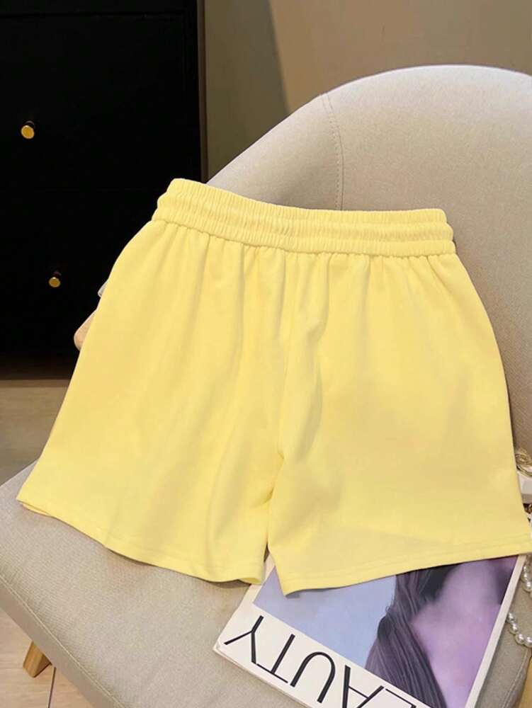 Resyla Women's Yellow Side Slit Shorts with Embroidered Lemon