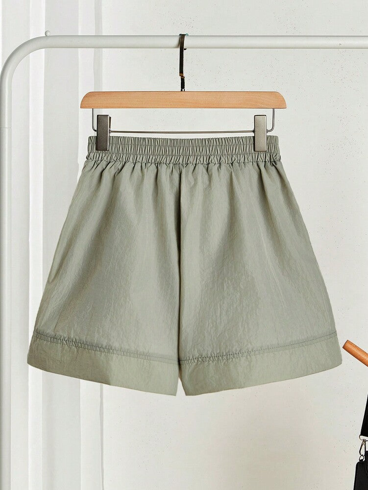 SHEIN EZwear Women's Solid Color Front Tie Pocket Casual Shorts