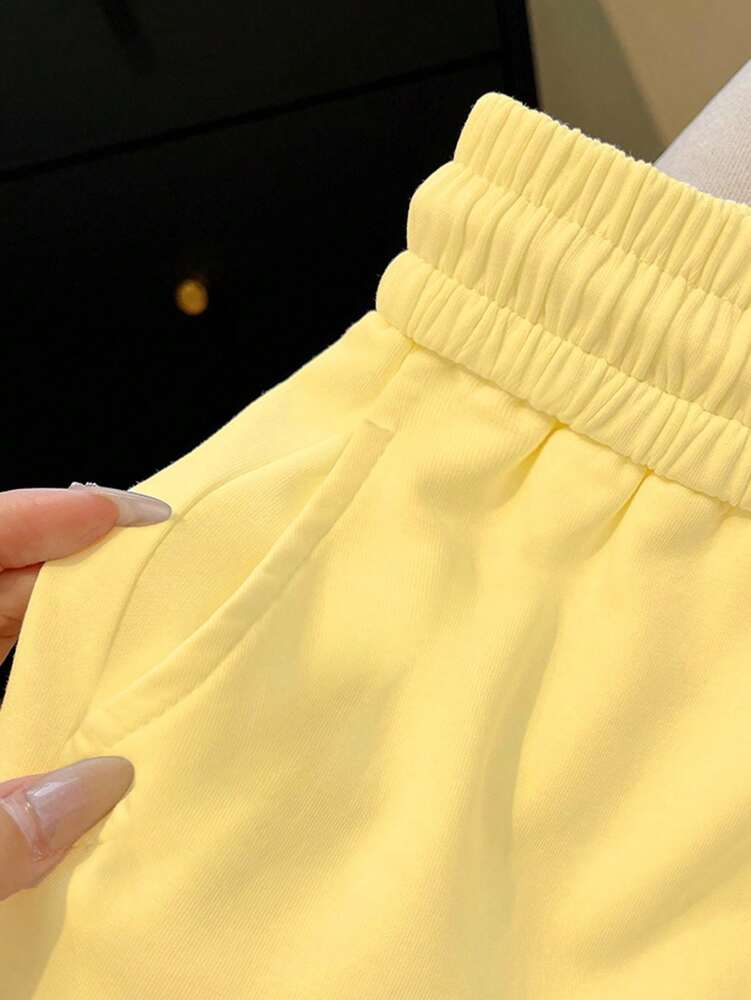 Resyla Women's Yellow Side Slit Shorts with Embroidered Lemon